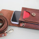 Women's leather mobile phone bag crossbody in chocolate brown color